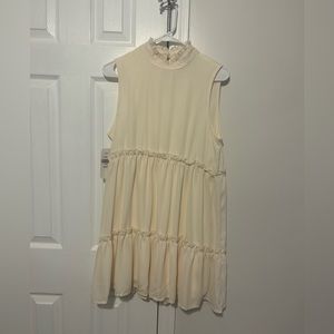 cream high neck sleeveless dress